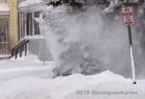 6 Jan 2015 man clears drive with snow blower in Fulton, NY where 3 feet of snow fell in less than 24 hours